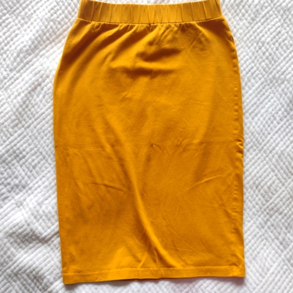 Girls mustard colored skirt 22 in